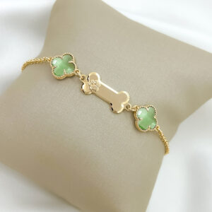 Pulseira trevos verde com ossinho folheado a ouro